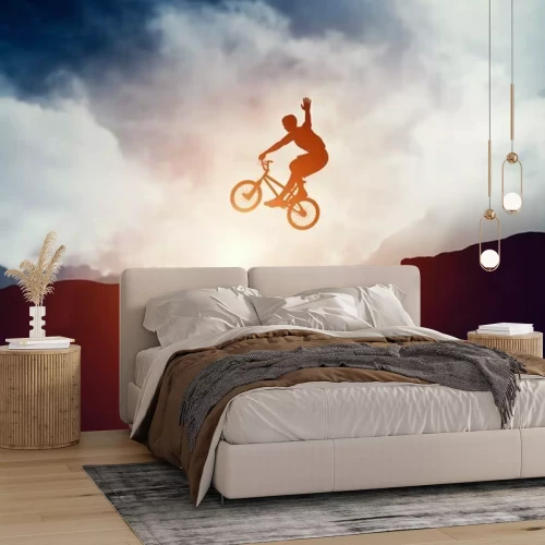 Fotobehang BMX-fiets en sprongen over rotsen