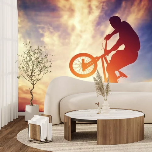 Fotobehang BMX-fiets en man bij zonsondergang