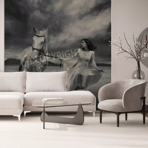 Fotobehang Vrouw en een paard op de achtergrond van wolken