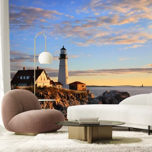 Fotobehang Vuurtoren bij de huizen