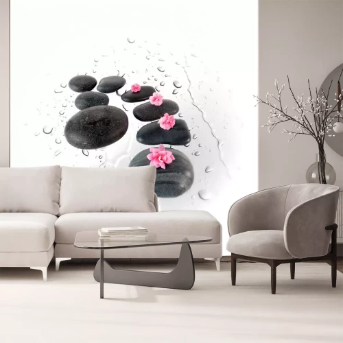Sticker Black spa stenen en roze bloemen op het water druppels