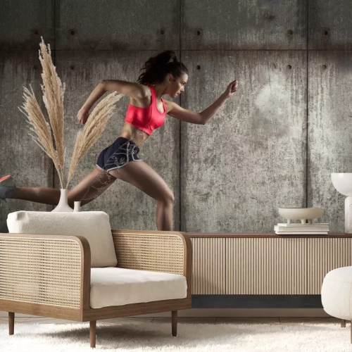 Fotobehang Een vrouw in sportkleding rent