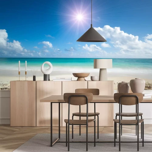 Fotobehang Strand en volle zon over de zee