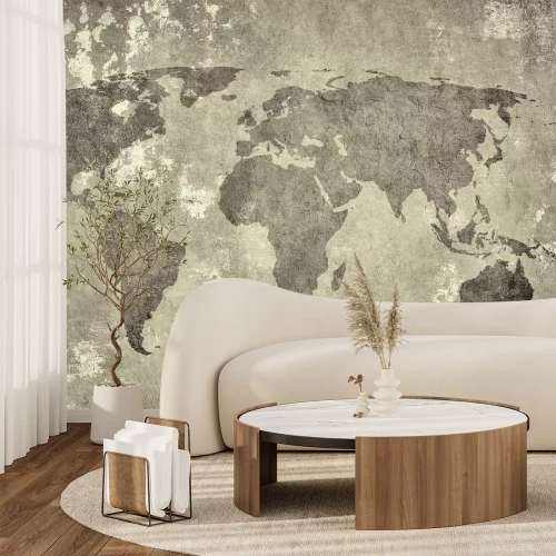 Fotobehang Een wereldkaart geschilderd op een betonnen textuur