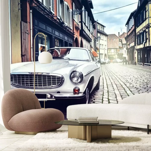 Fotobehang Retro auto in een oude straat