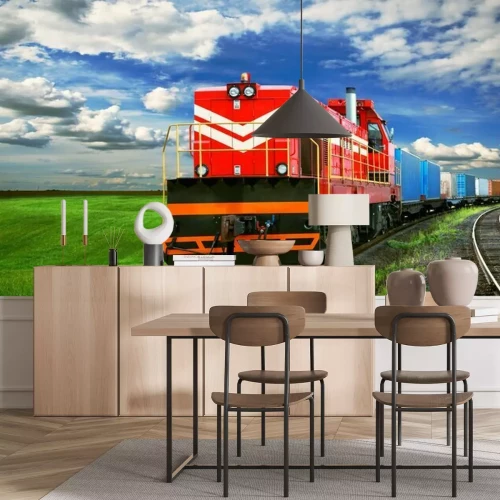 Fotobehang Een trein met een weide op de achtergrond