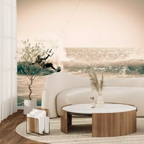 Fotobehang Een man die aan het kitesurfen is