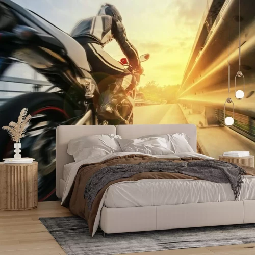 Fotobehang Een motorrijder die te hard rijdt op de weg