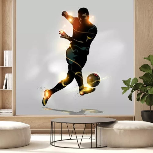 Fotobehang Silhouet van een voetballer die de bal schopt