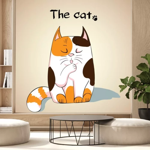 Sticker Babykat die een van zijn pootjes likt