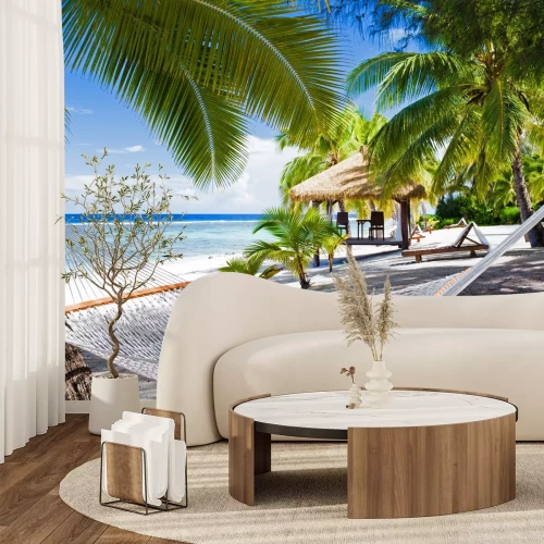 Fotobehang Hangmatten op een tropisch strand