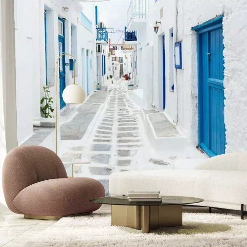 Fotobehang Griekse straat met witte huizen op Mykonos