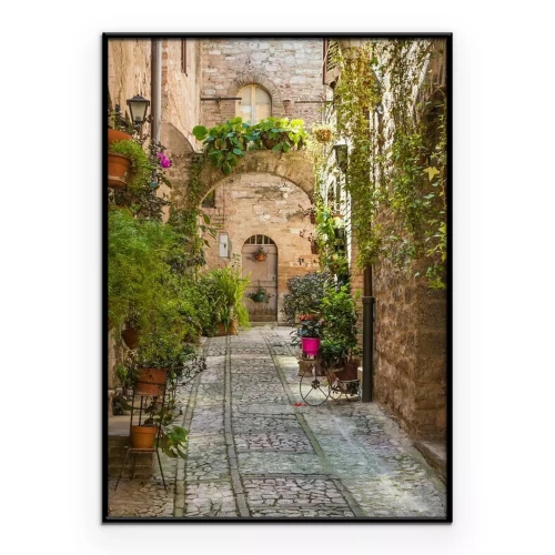 Poster Een charmante straat met een poort met een boog.