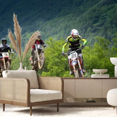 Fotobehang Motorrijders op een heuvel tijdens een motorcrossrace.