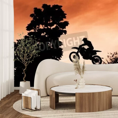 Fotobehang Status van silhouate motorcross springen over het oranje licht van de zonsondergang achtergrond.