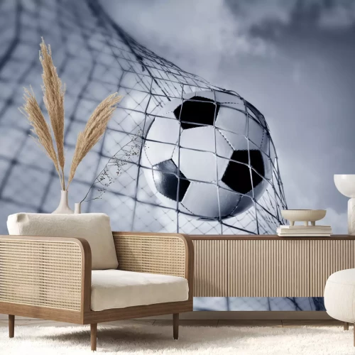 Fotobehang Bal in het net tegen de lucht