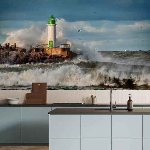 Fotobehang Vuurtoren bij de zee met golven