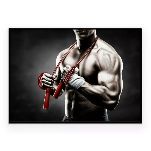 Poster Atletische man met een rood springtouw