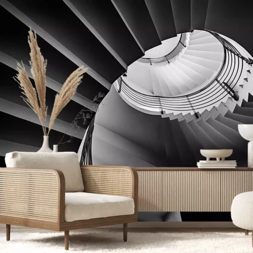 Fotobehang Zwart-wit foto van spiraalvormige trap schot van lage hoek.