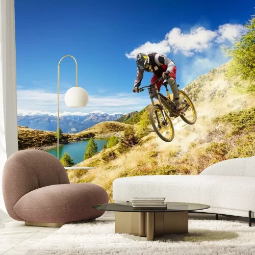 Sticker Een fietser die een helling afdaalt