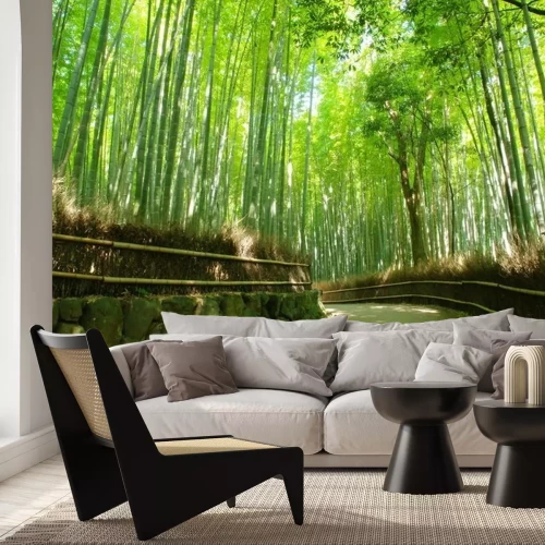 Fotobehang Pad leidend door een bamboebos