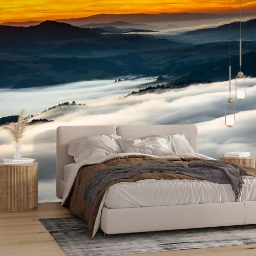 Fotobehang Oranje hemel bergen en wolken