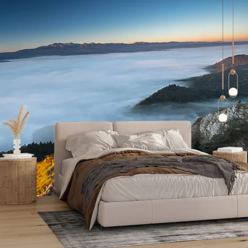 Fotobehang Bergen in dikke wolken