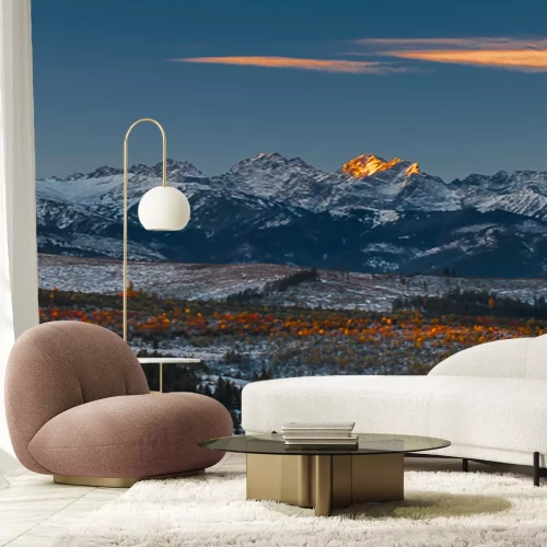 Fotobehang Zonsondergang boven de bergen