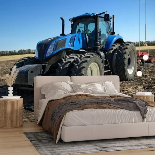 Fotobehang Blauwe tractor met ploeg