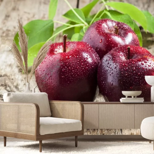 Sticker Drie kastanjebruine appels op tafel