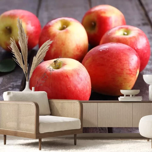 Sticker Appels verspreid over een houten tafel