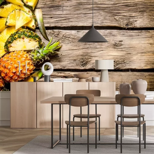 Sticker Ananas fruit op een houten tafel