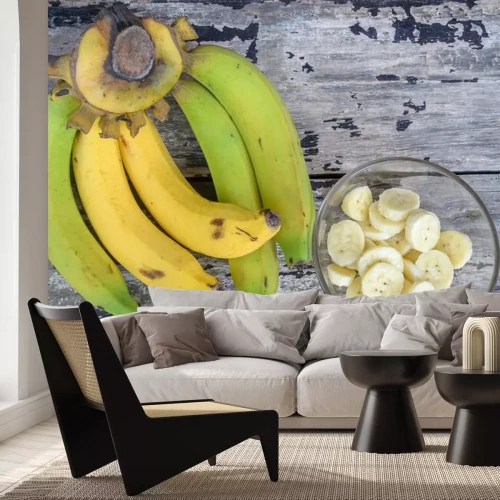 Sticker Hele en gesneden bananen in een kom