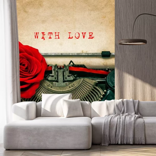 Sticker Een roos op een typemachine