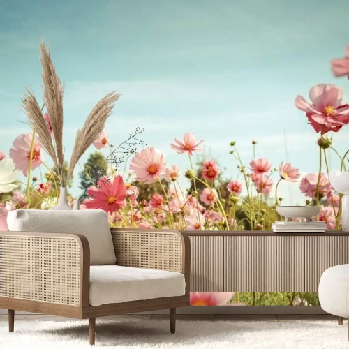 Fotobehang Weide met roze wilde bloemen