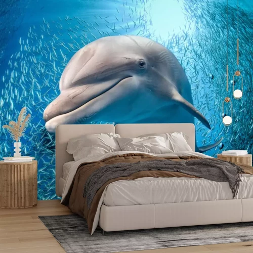 Sticker dolfijn onderwater op blauwe oceaan achtergrond