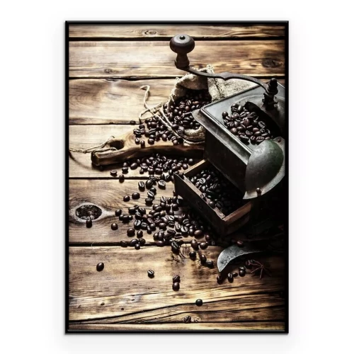 Poster Een klassieke handmolen omringd door verspreide koffiebonen.