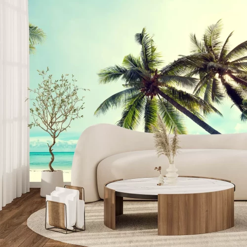 Fotobehang Palmbomen op een hemels strand