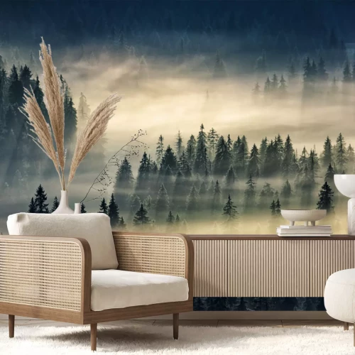 Fotobehang Zwarte bomen gehuld in geelachtige mist