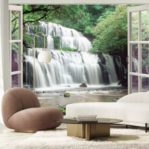 Fotobehang Uitzicht op de waterval buiten het raam