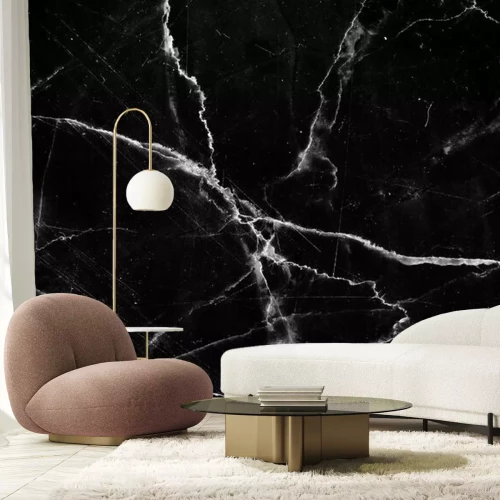 Fotobehang Witte barsten op zwart marmer