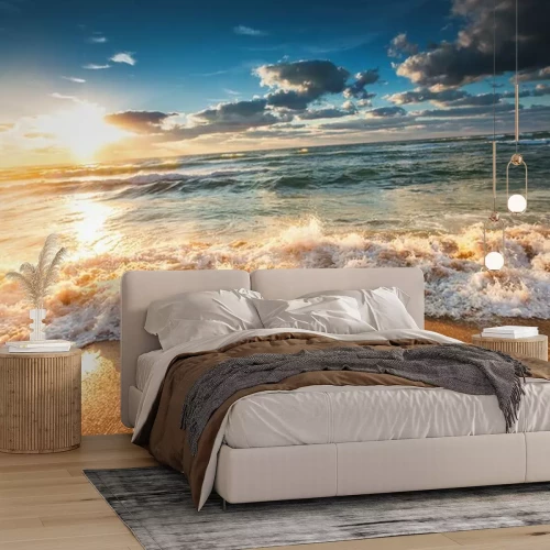 Fotobehang Wolken bij zonsondergang en de oceaan