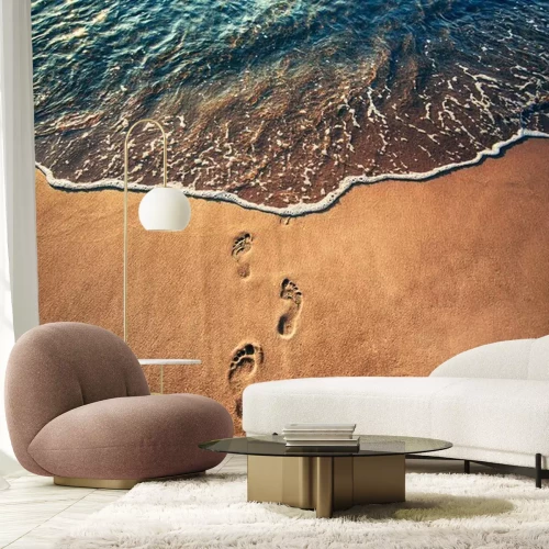 Fotobehang Strand en voetafdrukken