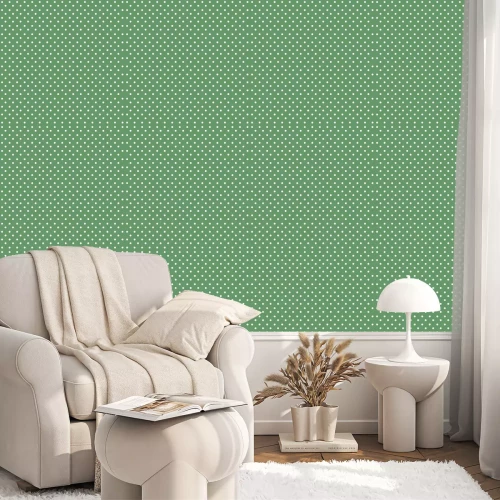 Behang Groen motief met witte stippen