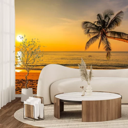 Fotobehang Strand palmbomen en de ondergaande zon