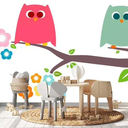 Sticker Twee kleurrijke uilen op een bloemrijke tak