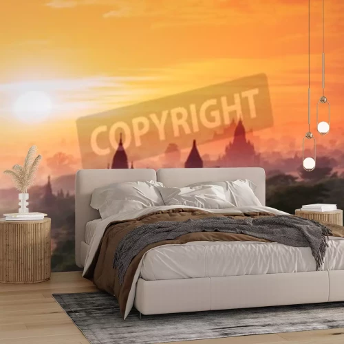 Fotobehang Zonsondergang boven Boeddhistische tempels