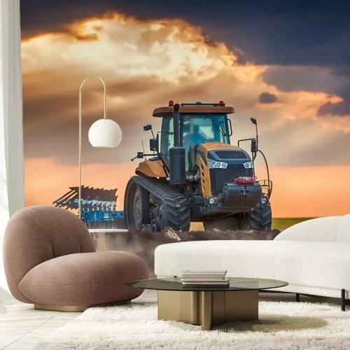 Fotobehang Landbouwer in tractor voorbereiding van grond met cultivator