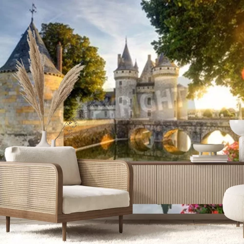 Fotobehang Het kasteel van Sully-sur-Loire in de zon met lens flare, Frankrijk. Dit kasteel is gelegen in de Loire-vallei, dateert uit de 14e eeuw en is een uitstekend voorbeeld van middeleeuwse vesting.