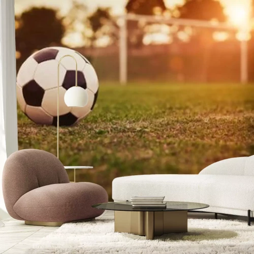 Fotobehang Voetbal in de zonsondergang